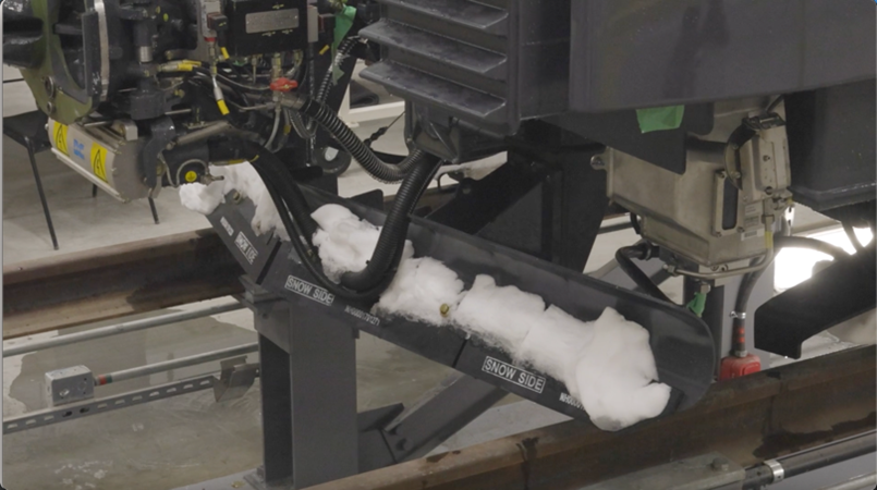 Image of a snowplow from an REM car