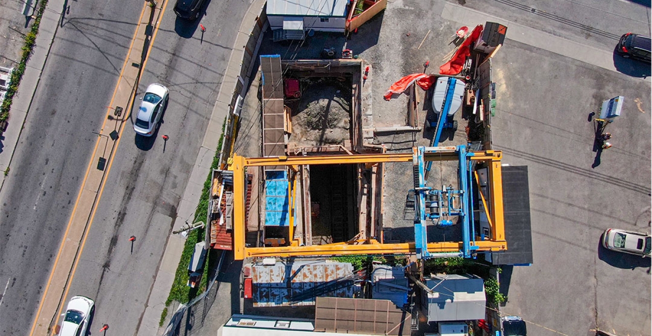 Reopening the foundation slab of the former Portal Heights station (for removal of material excavated from Mount Royal Tunnel) has revealed the old railway tracks, still present in the tunnel. August 2020