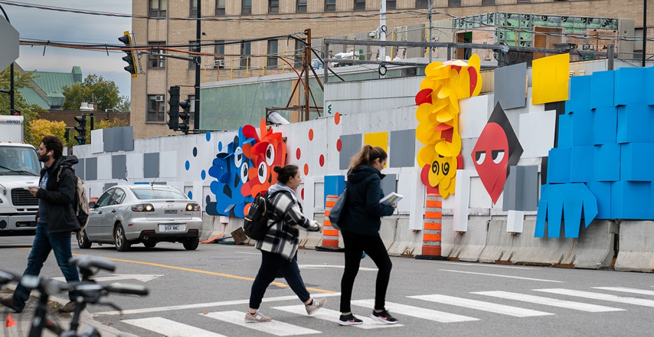 Concept ludique sur les palissades de chantier de la future station Édouard-Montpetit | MASSIVart et La Camaraderie