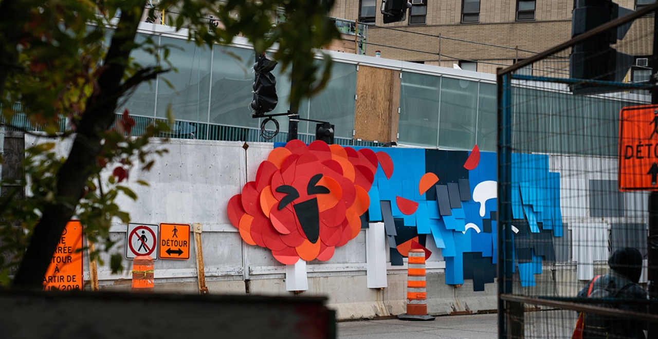 Concept ludique sur les palissades de chantier de la future station Édouard-Montpetit | MASSIVart et La Camaraderie